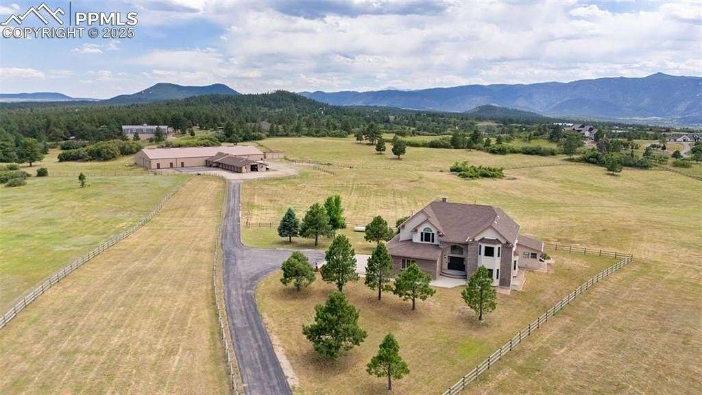 35.6 Acres of Agricultural Land with Home for Sale in Larkspur, Colorado