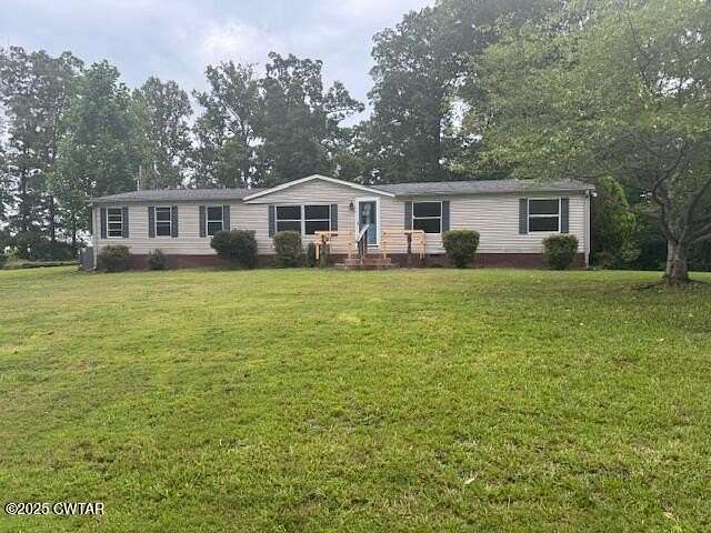 1.79 Acres of Residential Land with Home for Sale in Parsons, Tennessee