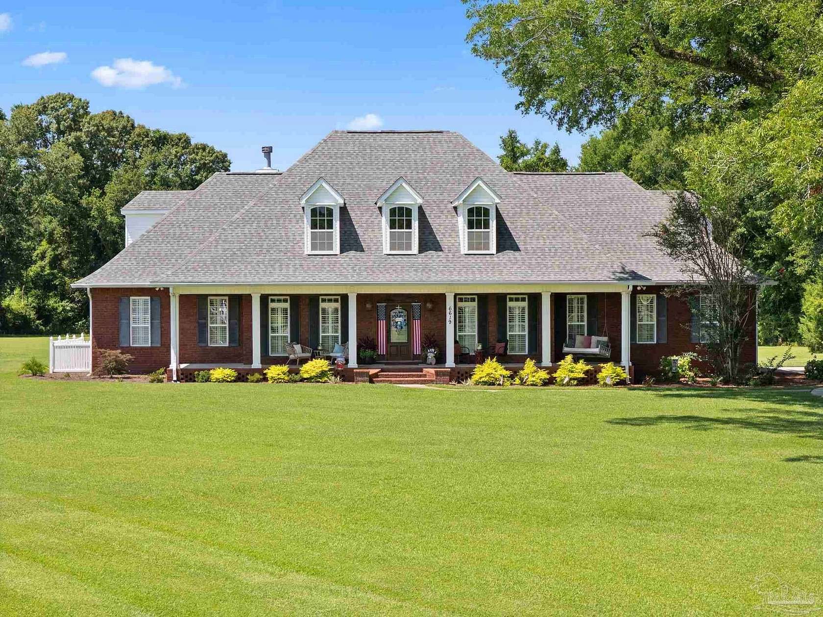 4.24 Acres of Residential Land with Home for Sale in Pace, Florida