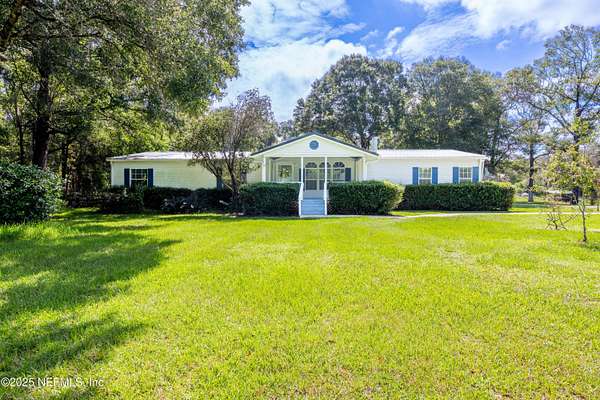 12.4 Acres of Recreational Land with Home for Sale in Starke, Florida