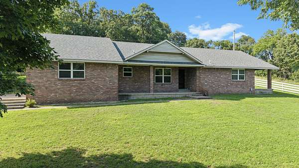 10.7 Acres of Land with Home for Sale in Miami, Oklahoma