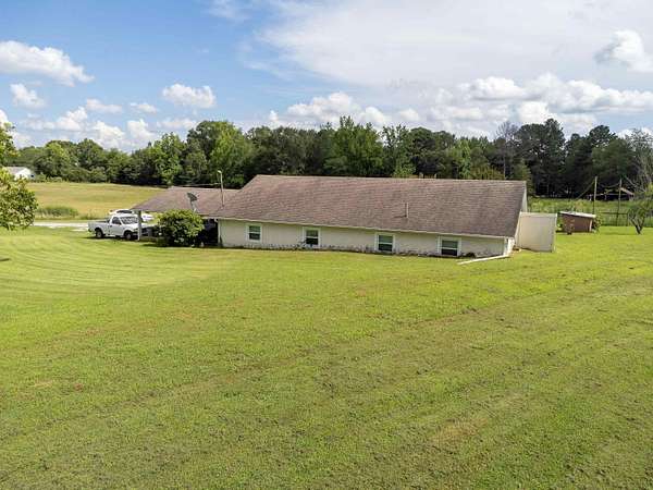 7.6 Acres of Land with Home for Sale in Florence, Alabama