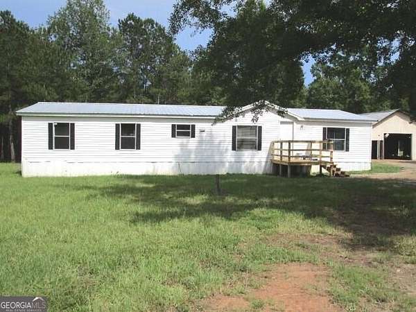 4.68 Acres of Residential Land with Home for Sale in Box Springs, Georgia