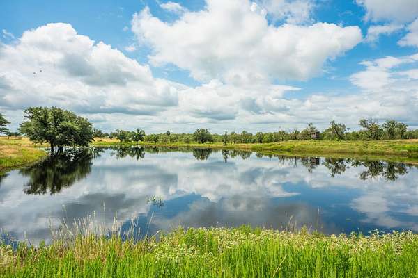 176 Acres of Agricultural Land with Home for Sale in Llano, Texas
