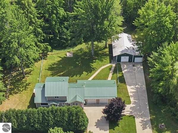10 Acres of Land with Home for Sale in Cadillac, Michigan