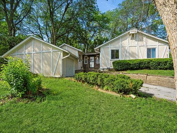 8 Acres of Land with Home for Sale in Norwalk, Iowa