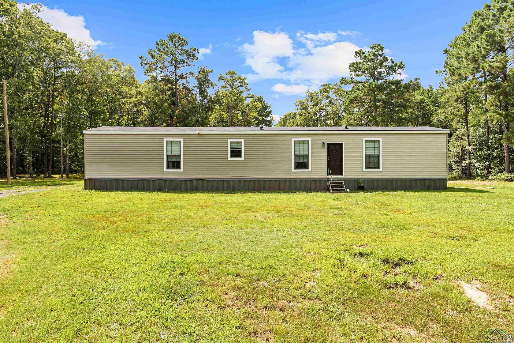 6.9 Acres of Residential Land with Home for Sale in Karnack, Texas