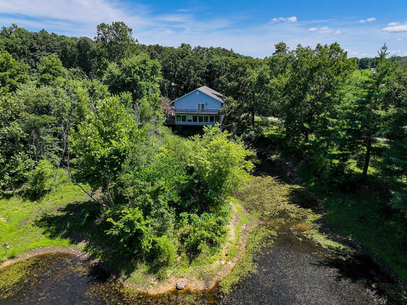 7.5 Acres of Land with Home for Sale in Osceola, Missouri