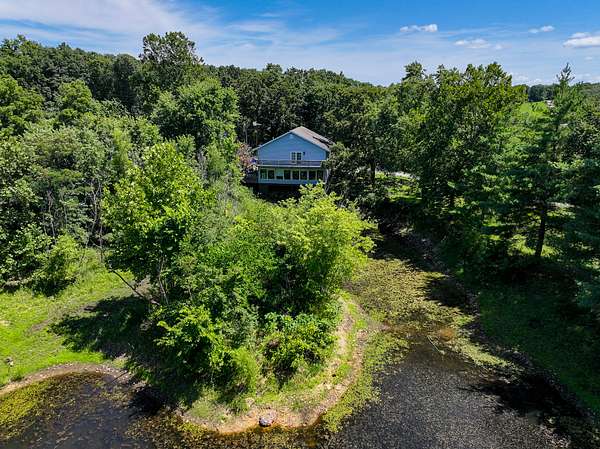 7.5 Acres of Land with Home for Sale in Osceola, Missouri