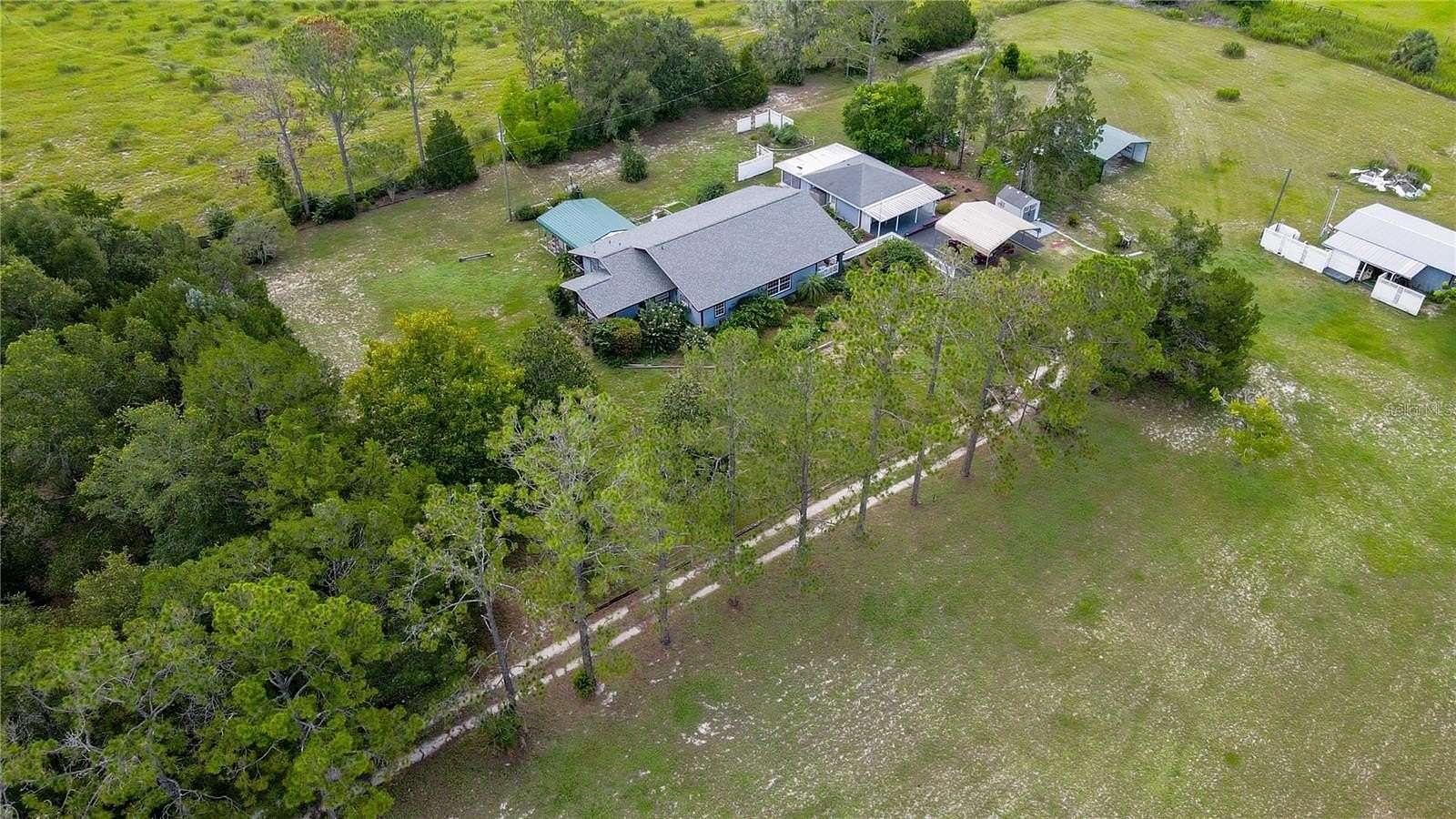 5 Acres of Residential Land with Home for Sale in Eustis, Florida