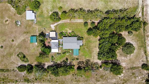 5 Acres of Residential Land with Home for Sale in Eustis, Florida