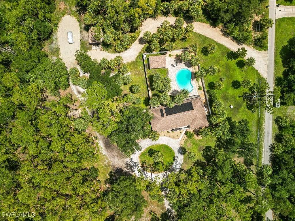 4.9 Acres of Residential Land with Home for Sale in North Fort Myers, Florida