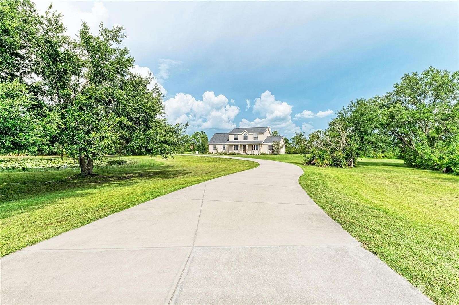 9.56 Acres of Land with Home for Sale in Myakka City, Florida