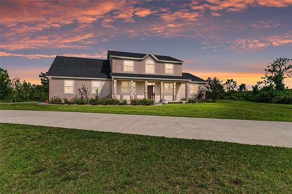 9.56 Acres of Land with Home for Sale in Myakka City, Florida