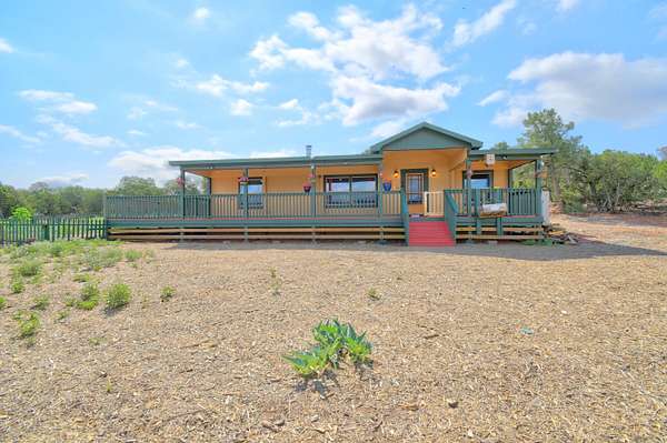 5 Acres of Residential Land with Home for Sale in Tijeras, New Mexico