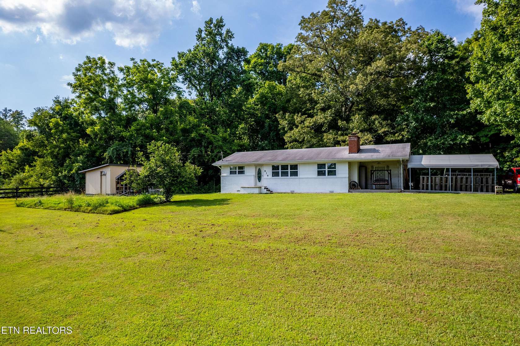 11.3 Acres of Land with Home for Sale in Strawberry Plains, Tennessee