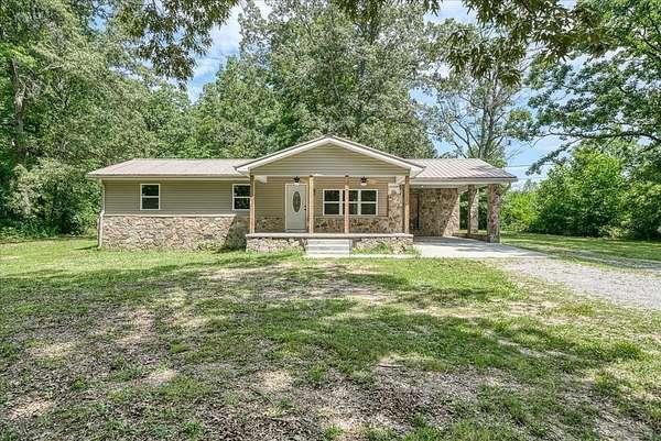 3.1 Acres of Residential Land with Home for Sale in Crossville, Tennessee