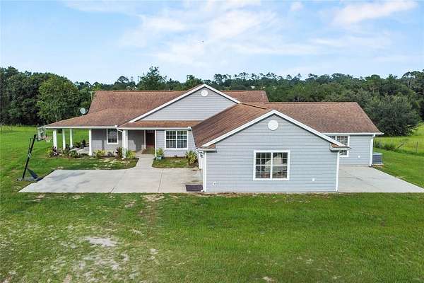 7.4 Acres of Land with Home for Sale in Weirsdale, Florida
