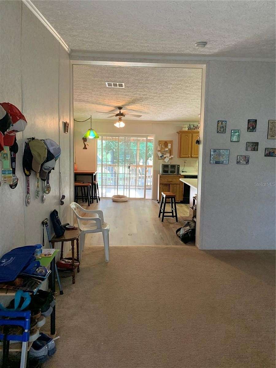 1.82 Acres of Residential Land with Home for Sale in Dunnellon, Florida