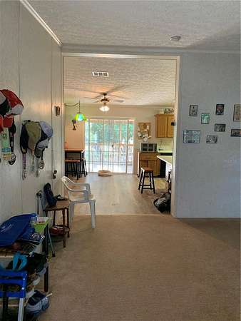 1.82 Acres of Residential Land with Home for Sale in Dunnellon, Florida