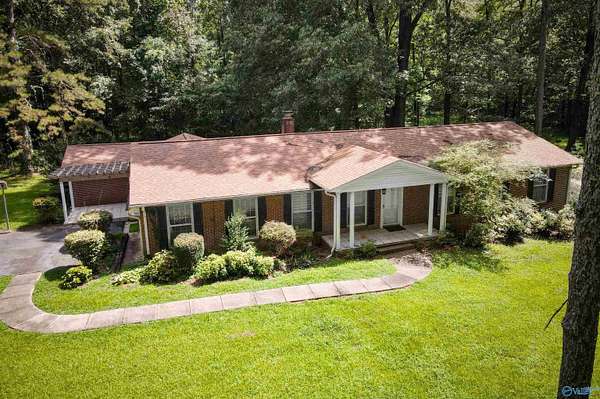 7.7 Acres of Residential Land with Home for Sale in Hartselle, Alabama