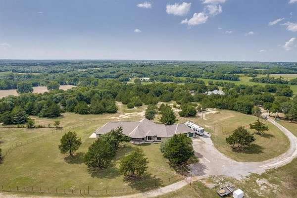 29.4 Acres of Agricultural Land with Home for Sale in Whitewright, Texas