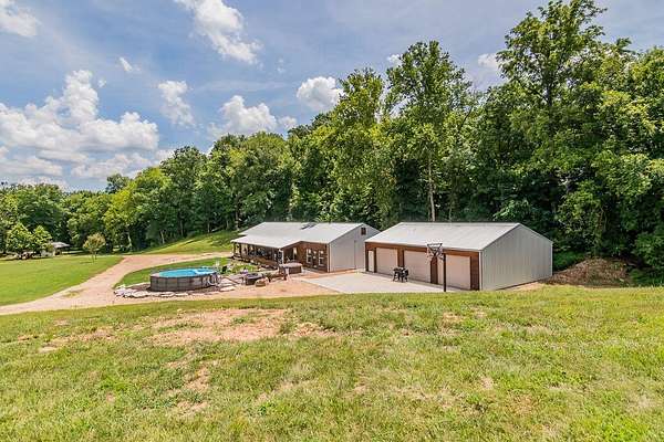75 Acres of Land with Home for Sale in Galena, Missouri