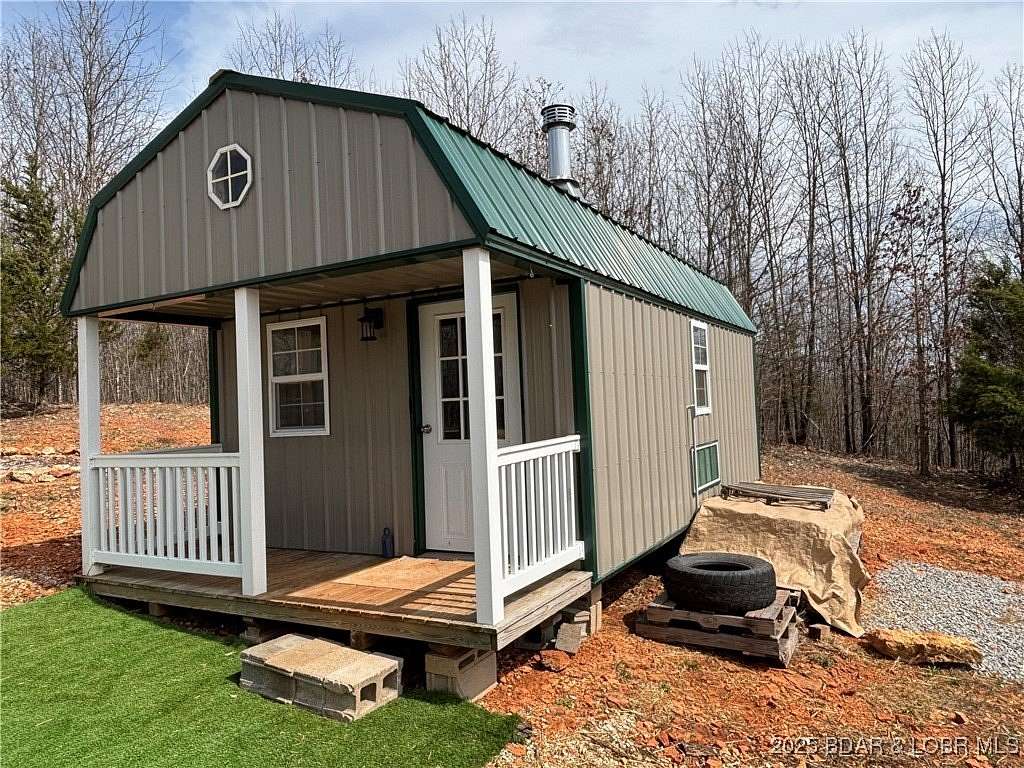 5.22 Acres of Residential Land with Home for Sale in Stover, Missouri