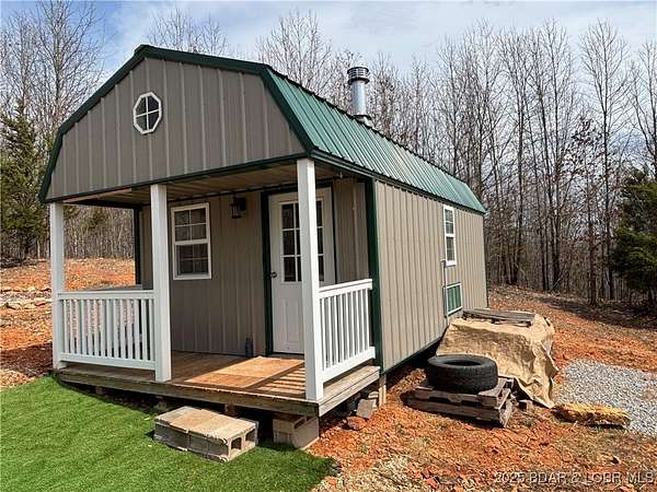 5.22 Acres of Residential Land with Home for Sale in Stover, Missouri