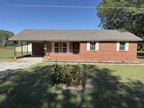 4.87 Acres of Land with Home for Sale in Grand Junction, Tennessee