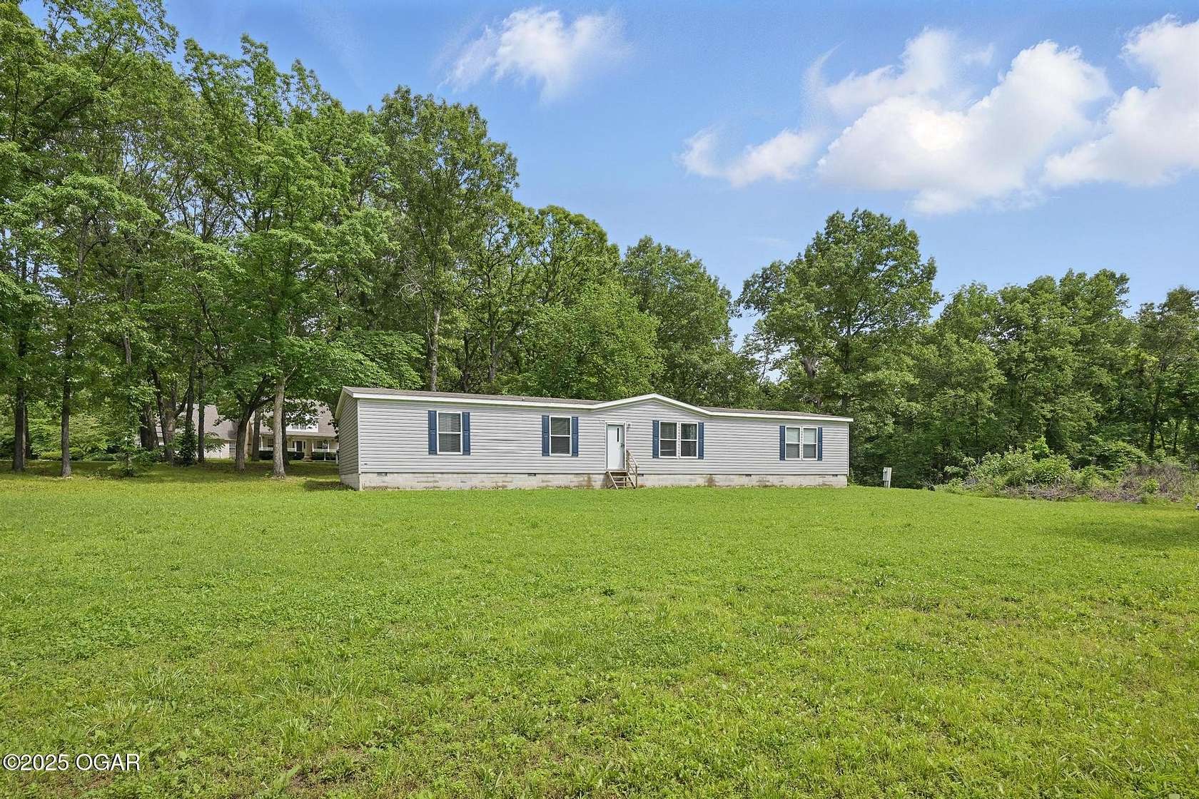 2 Acres of Residential Land with Home for Sale in Carthage, Missouri