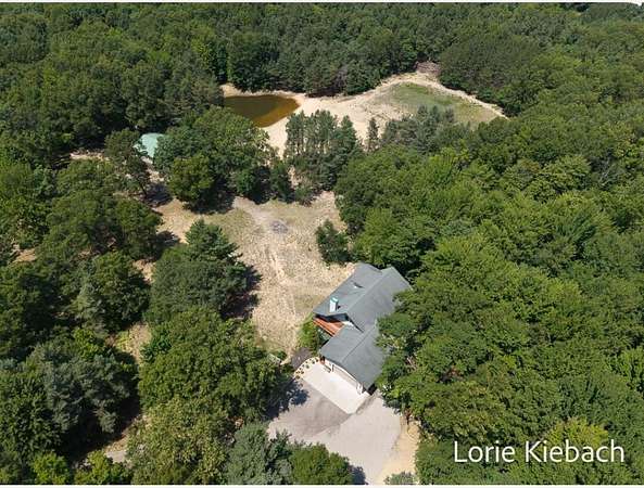 30 Acres of Recreational Land with Home for Sale in Spring Lake, Michigan