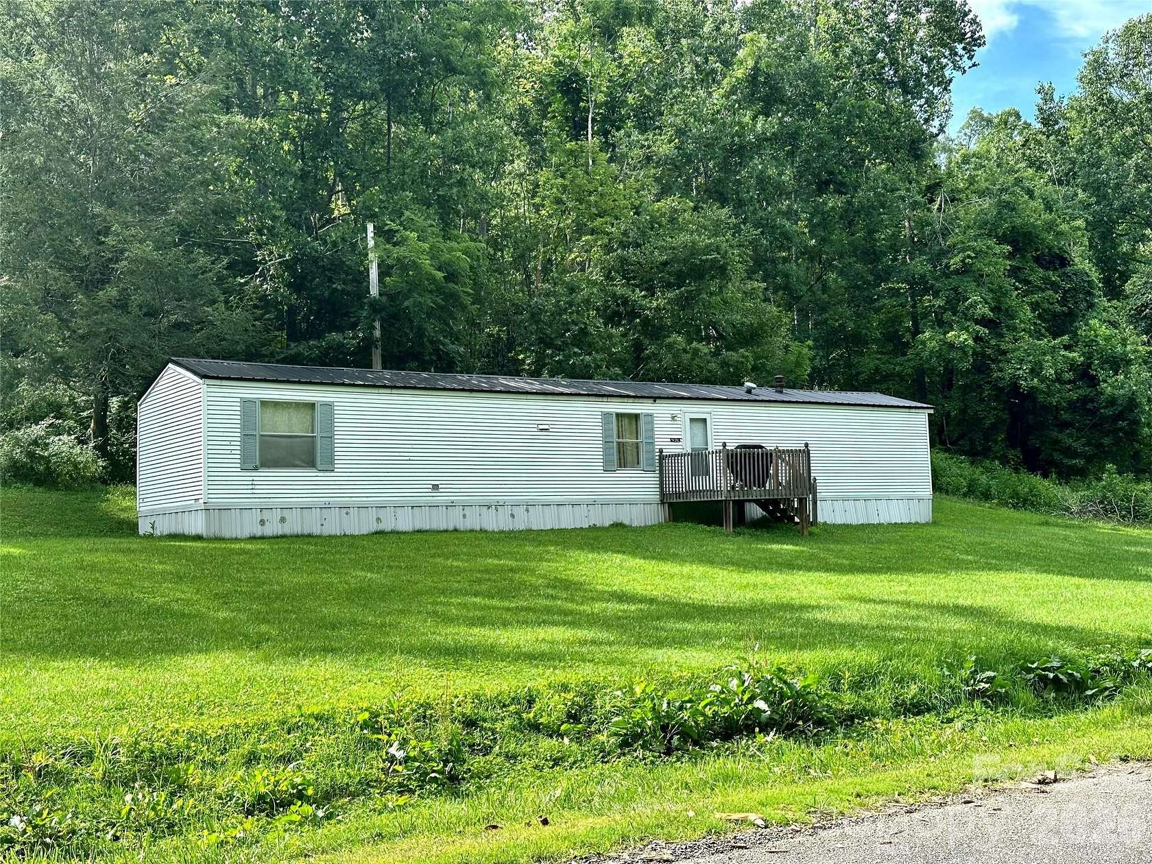 1.5 Acres of Land with Home for Sale in Spruce Pine, North Carolina