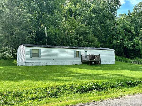 1.5 Acres of Land with Home for Sale in Spruce Pine, North Carolina