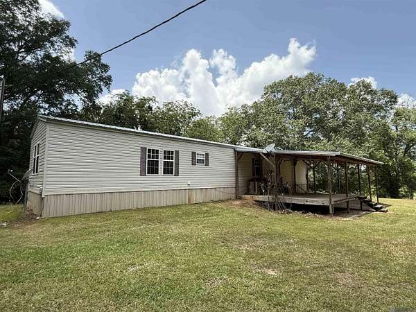 1.73 Acres of Residential Land with Home for Sale in Roseland, Louisiana