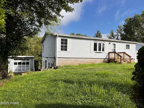 2 Acres of Residential Land with Home for Sale in Beach Lake, Pennsylvania