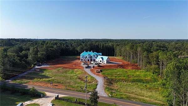 12.2 Acres of Land with Home for Sale in Milton, Georgia