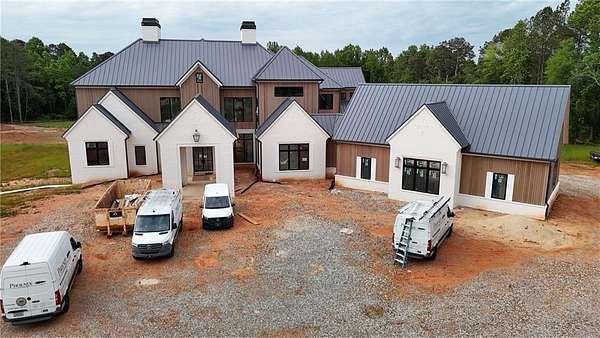 12.2 Acres of Land with Home for Sale in Milton, Georgia