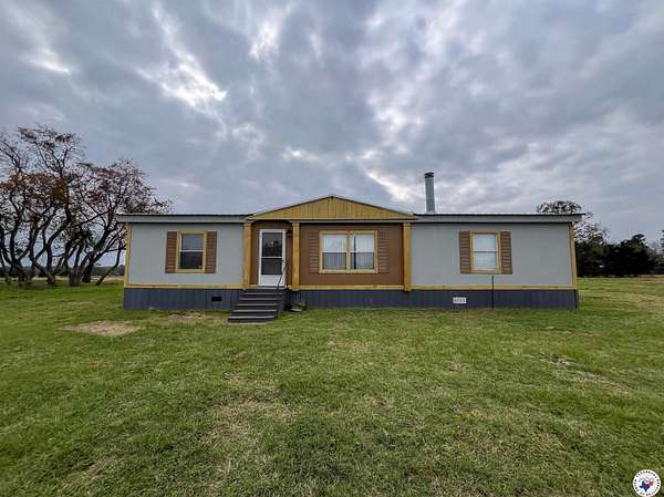 22 Acres of Land with Home for Sale in Avery, Texas