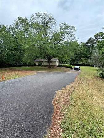 1.85 Acres of Residential Land with Home for Sale in Peachtree Corners, Georgia