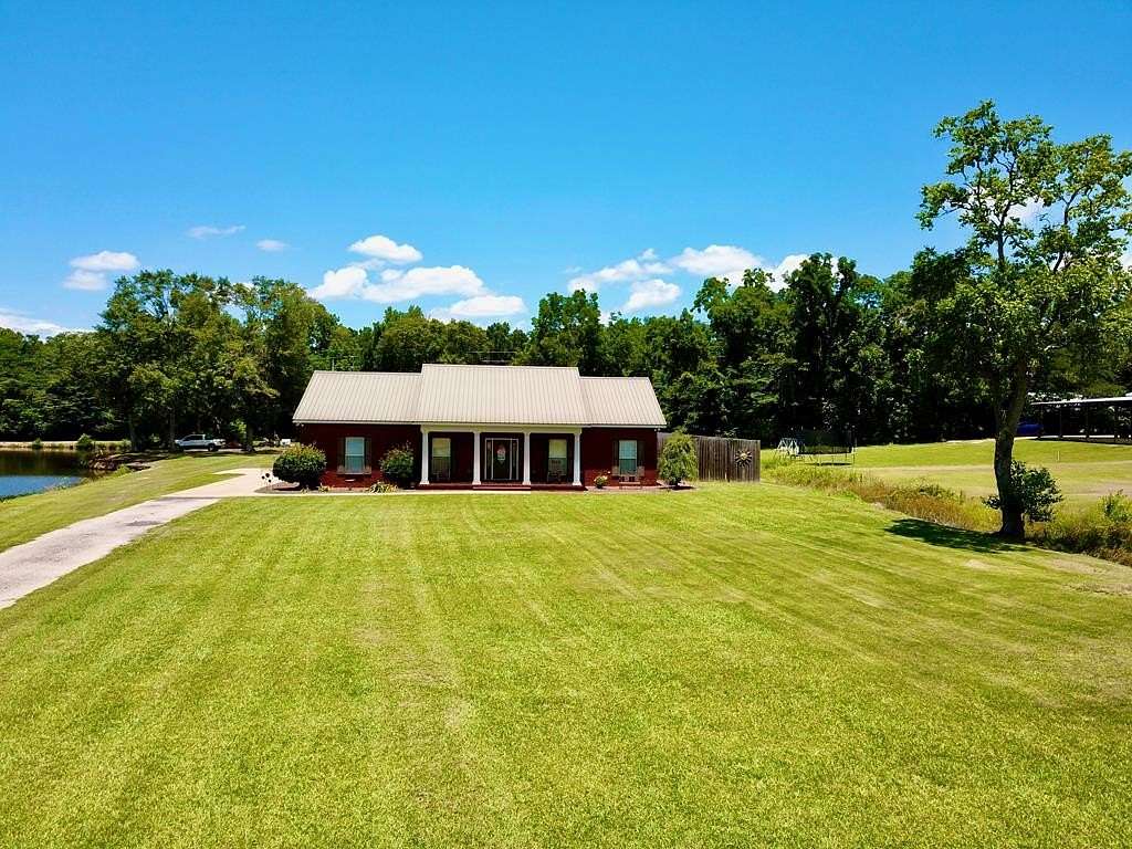 6.5 Acres of Land with Home for Sale in Slocomb, Alabama