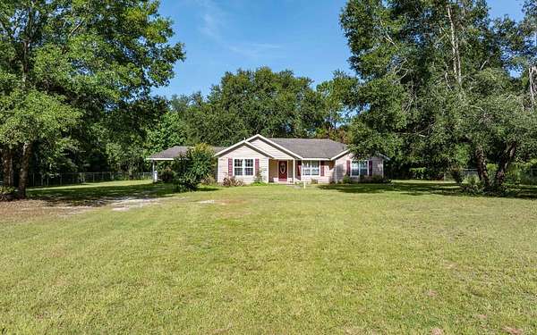 12.7 Acres of Land with Home for Sale in Lake City, Florida