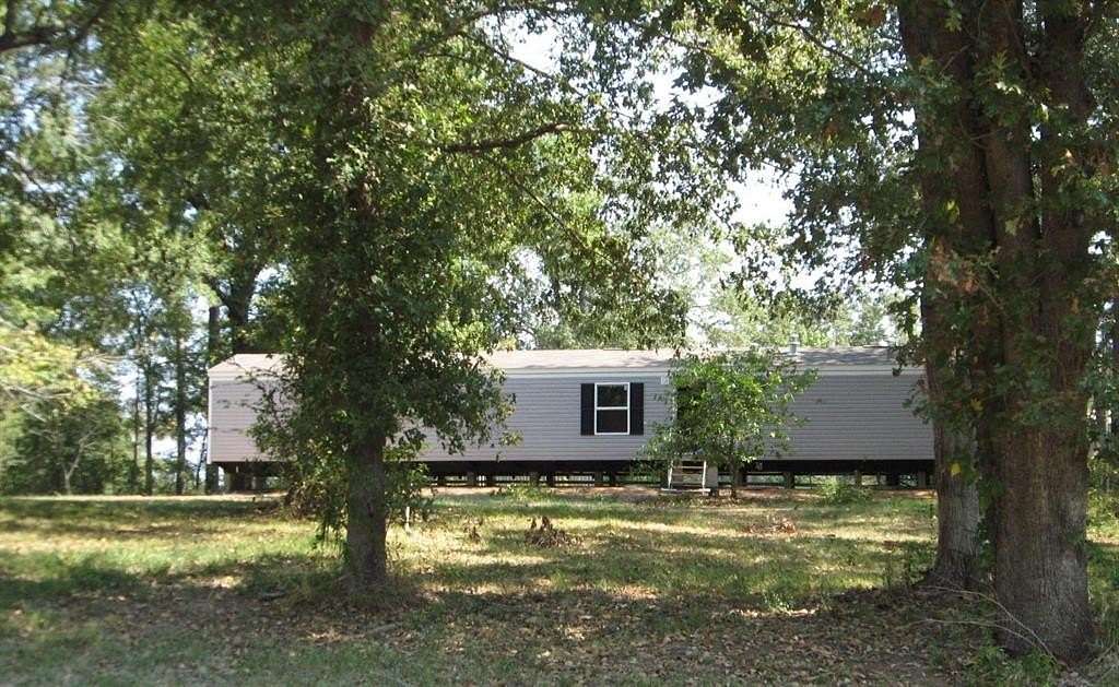 2.78 Acres of Residential Land with Home for Sale in Elm Grove, Louisiana