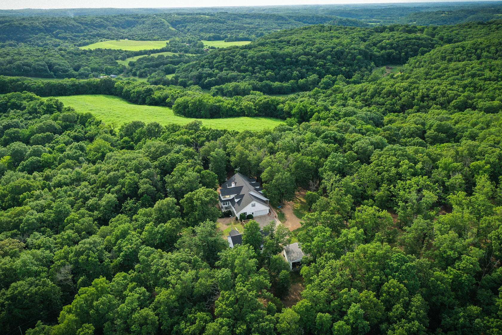 20.4 Acres of Land with Home for Sale in Washburn, Missouri