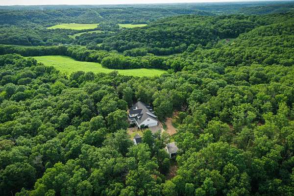 20.4 Acres of Land with Home for Sale in Washburn, Missouri