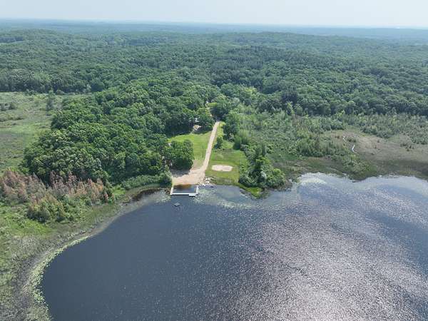 147 Acres of Recreational Land with Home for Sale in Howell, Michigan