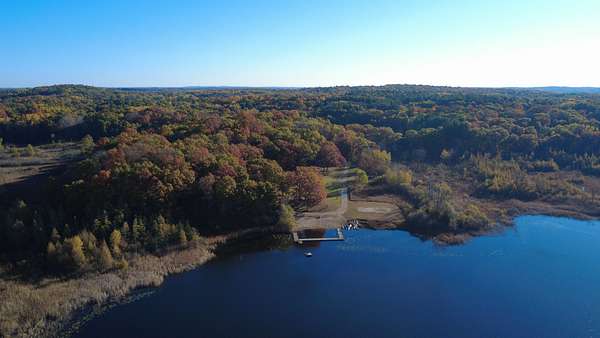 147 Acres of Recreational Land with Home for Sale in Howell, Michigan