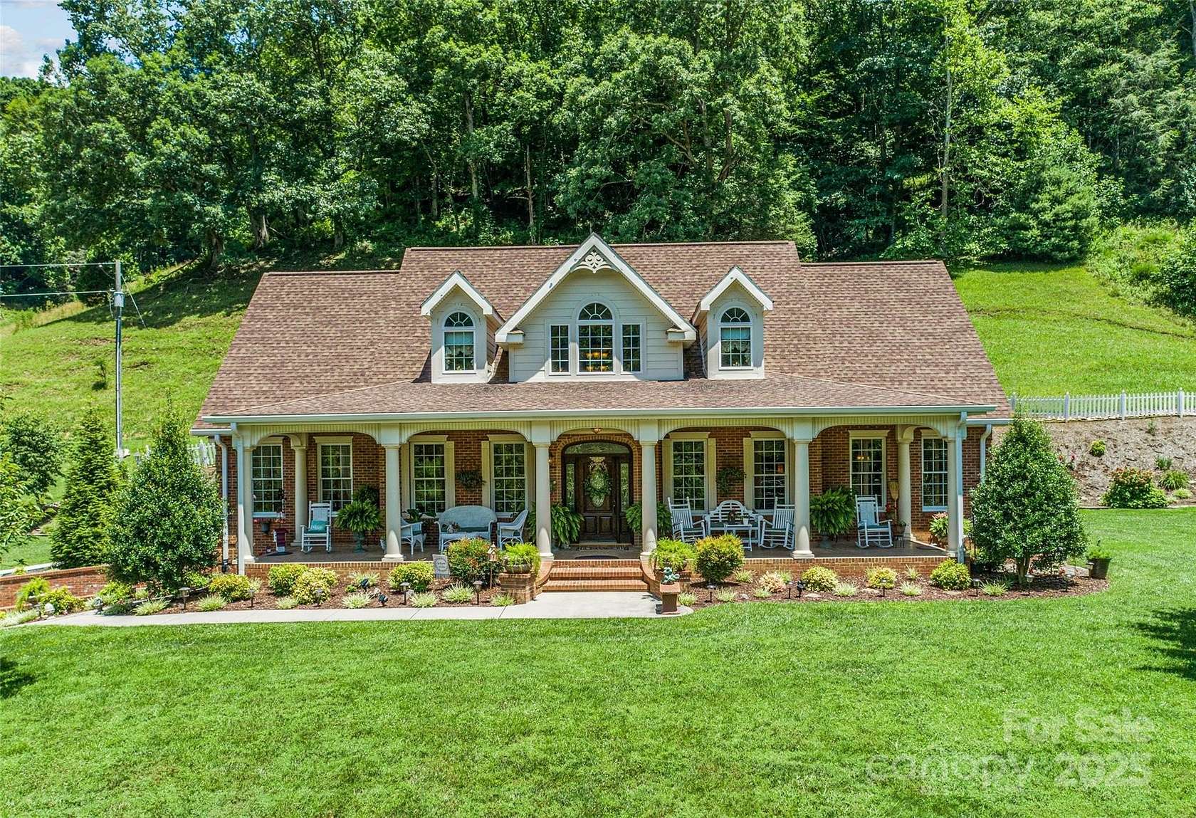 11.1 Acres of Land with Home for Sale in Green Mountain, North Carolina