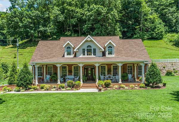 11.1 Acres of Land with Home for Sale in Green Mountain, North Carolina