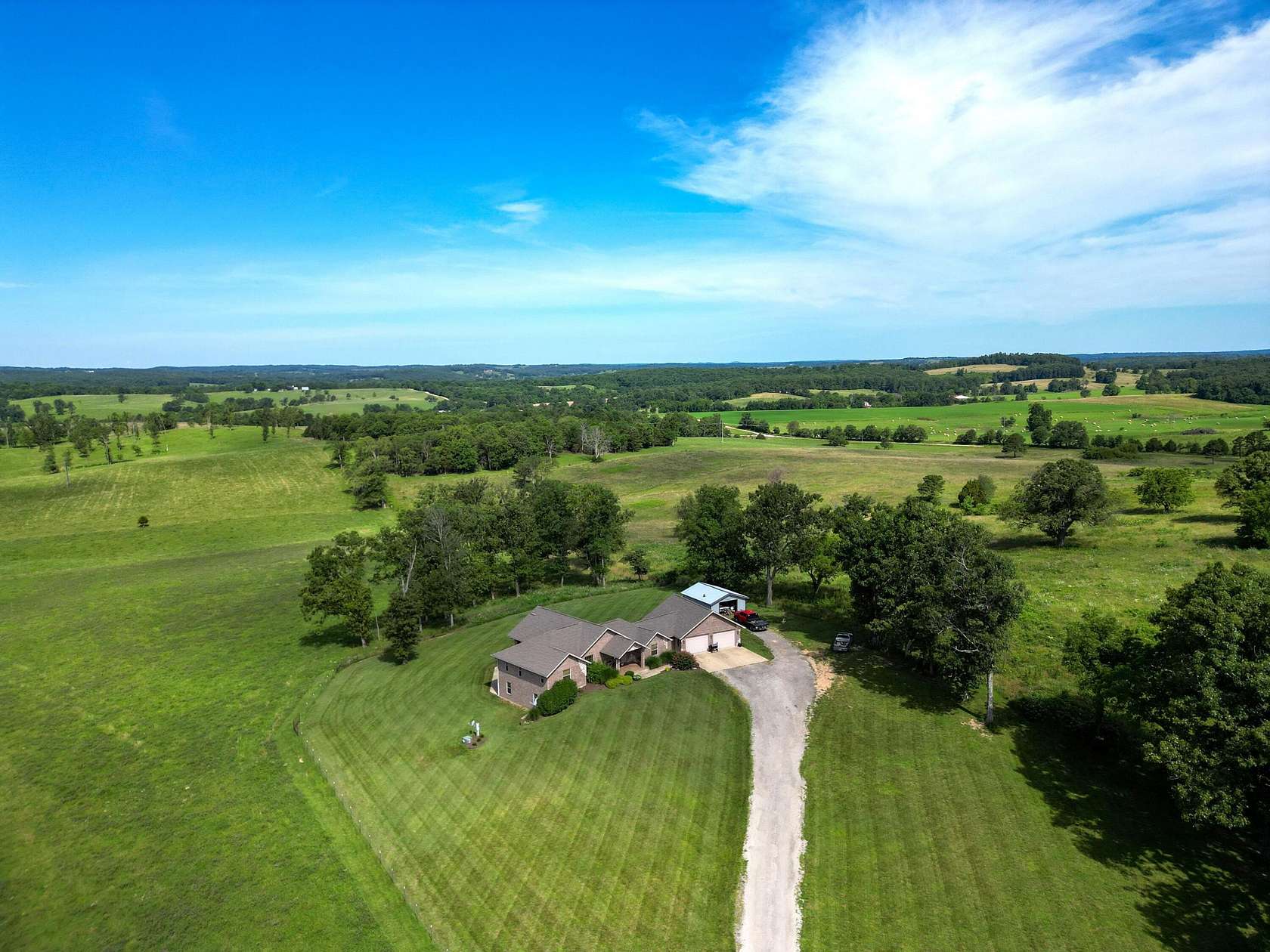 14.3 Acres of Land with Home for Sale in Vanzant, Missouri